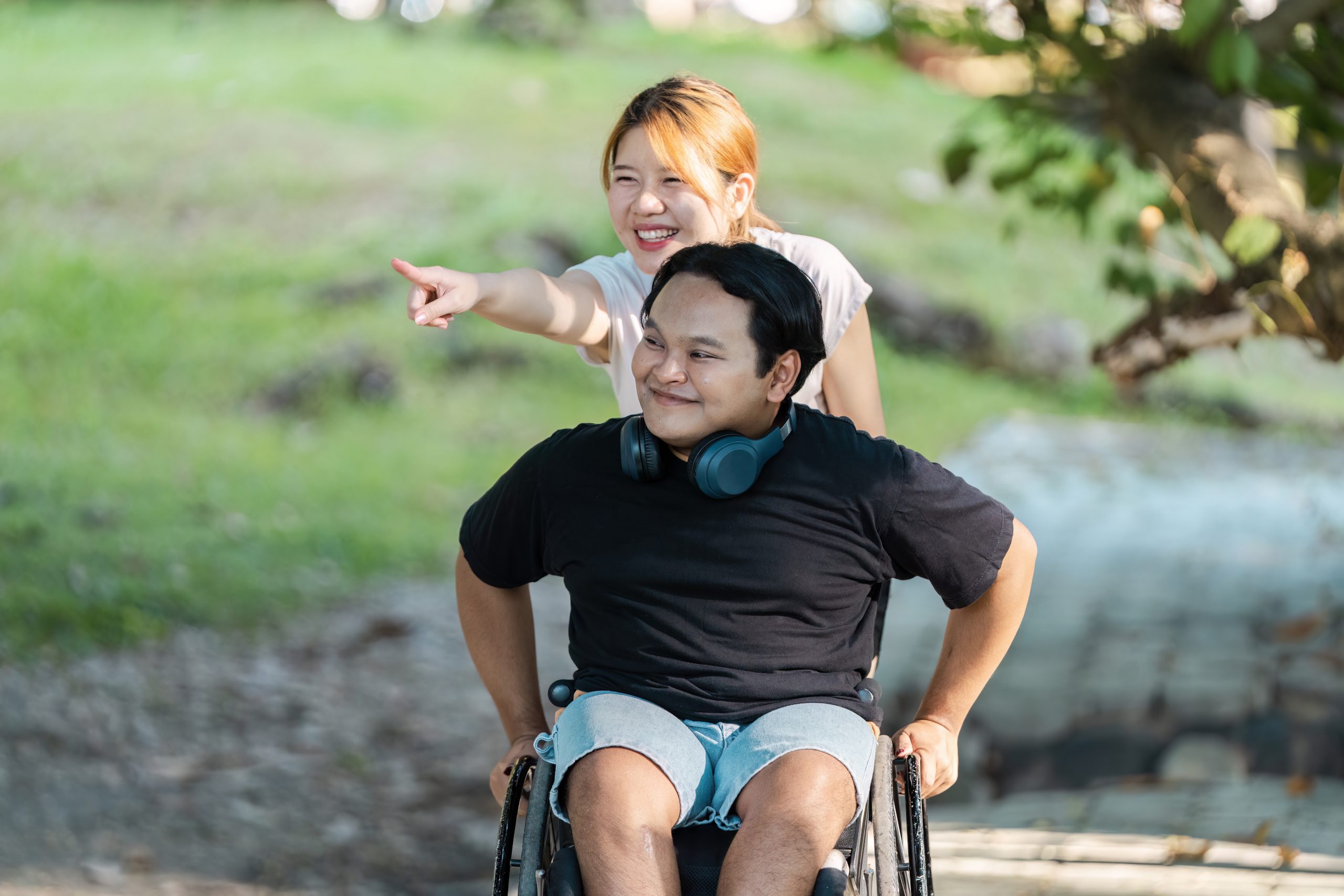 Joyful Friends Enjoying Outdoor Activities Together in a Park Setting